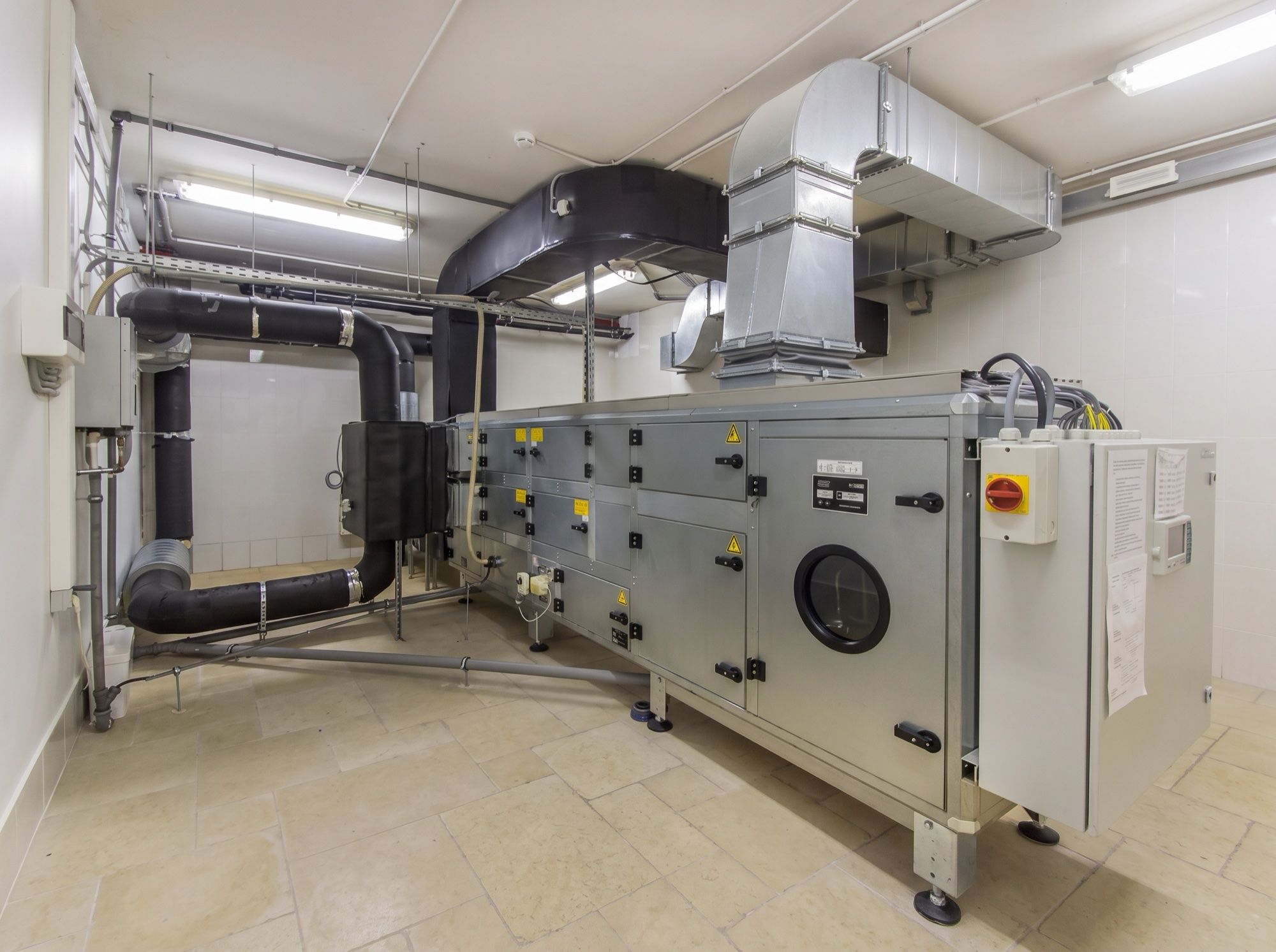 A cool room's air-handling unit with its control panel